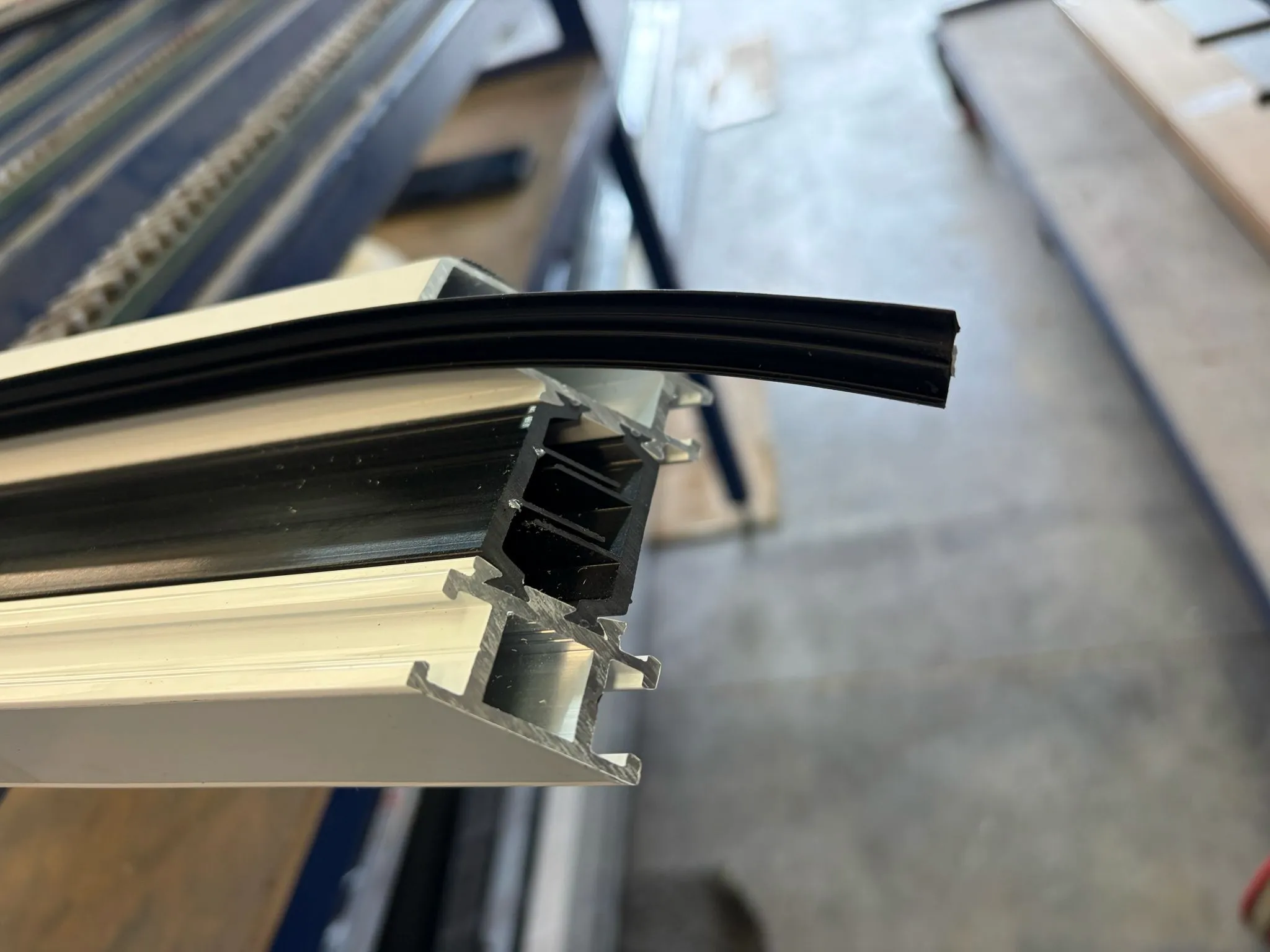 Aluminium bifold door frame assembly at the Glazed Windows Ltd Birmingham workshop